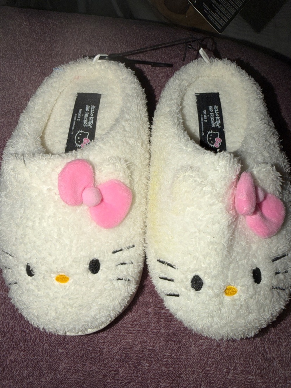 Hello Kitty Cream Plush Slippers with Pink Bows
